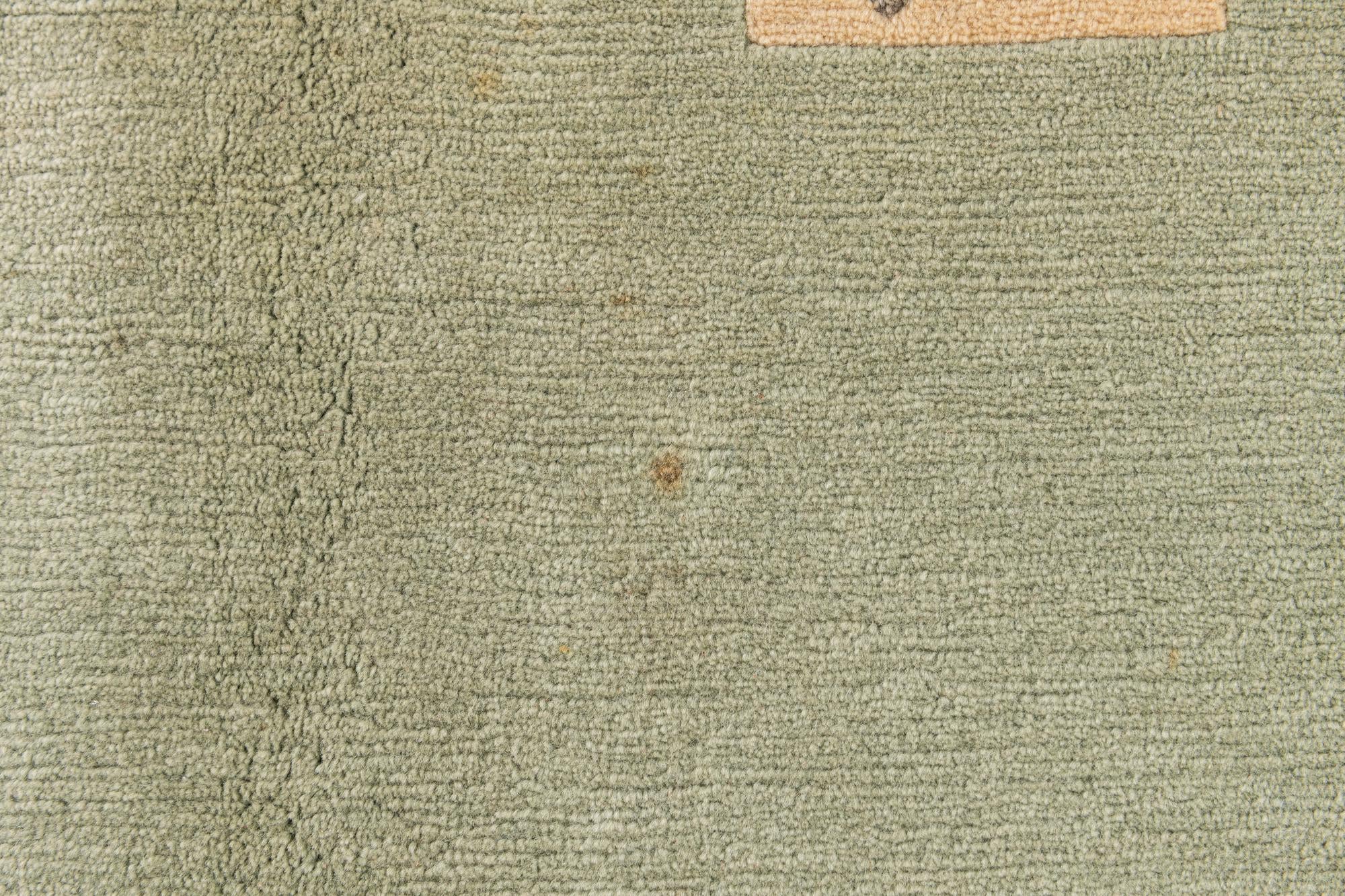 5' 9 x 7' 9 Hand Knotted Tibet Wool Rug