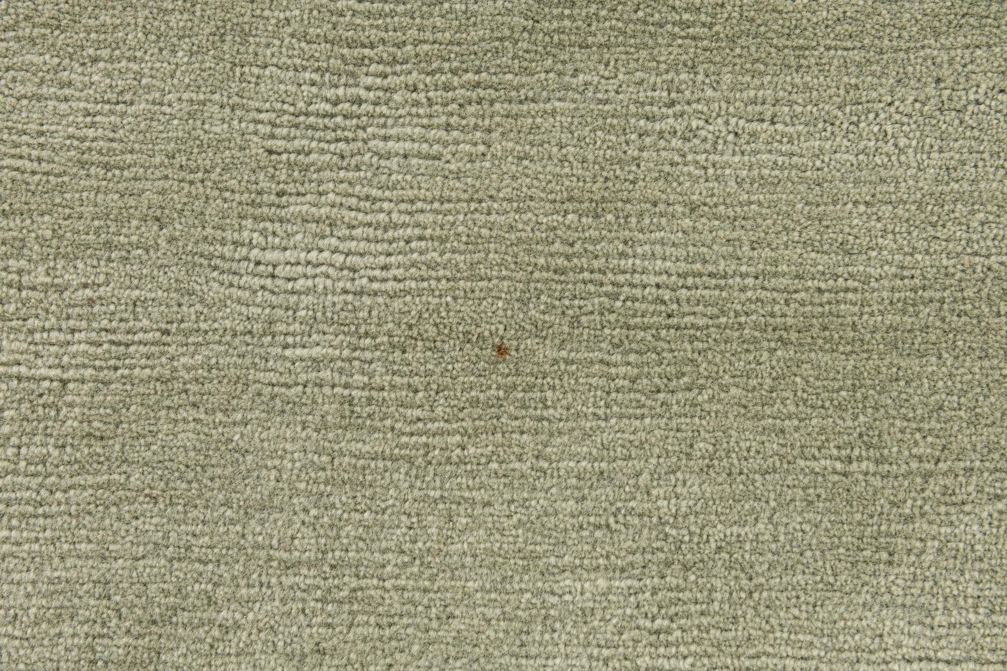 5' 9 x 7' 9 Hand Knotted Tibet Wool Rug