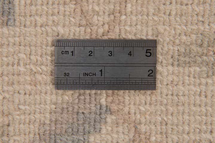 3' 11 x 5' 10 Hand Knotted Tibet Wool Rug