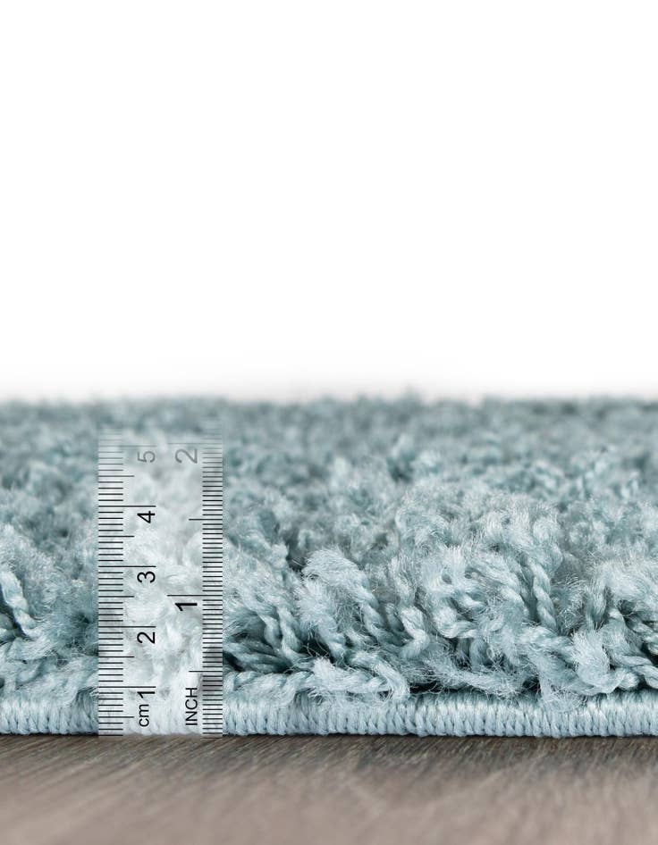 Detail image of 5' 3 x 8' Solid Shag Oval Rug