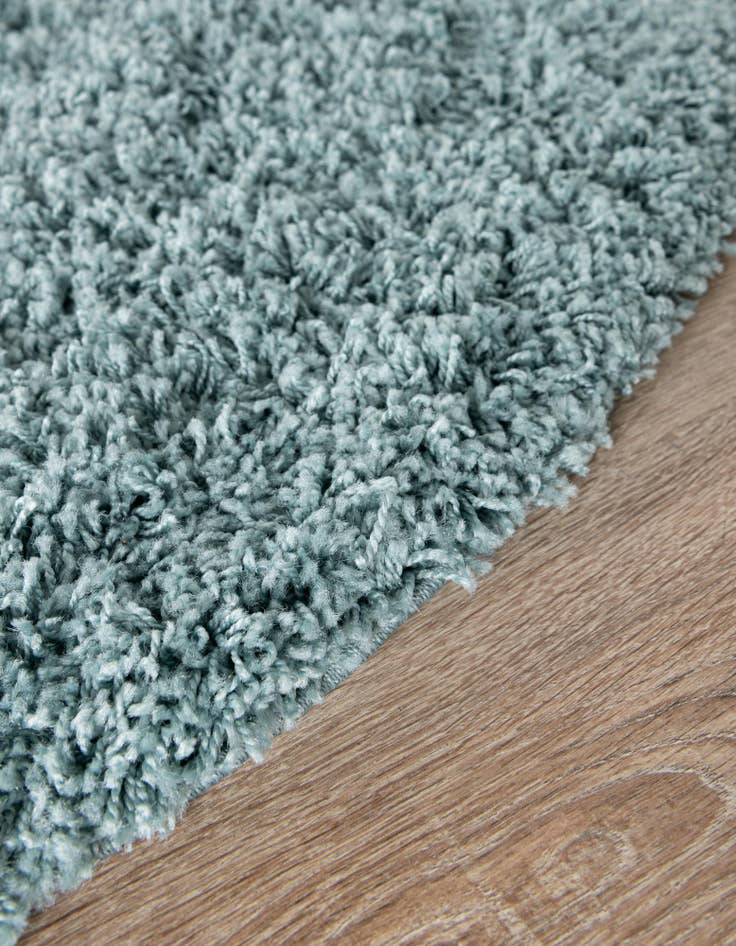 Detail image of 5' 3 x 8' Solid Shag Oval Rug