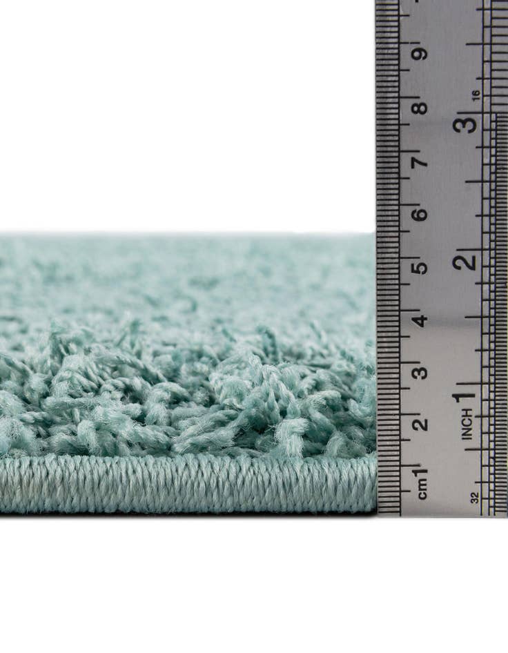 Detail image of 9' 10 x 14' Comfort Solid Shag Rug