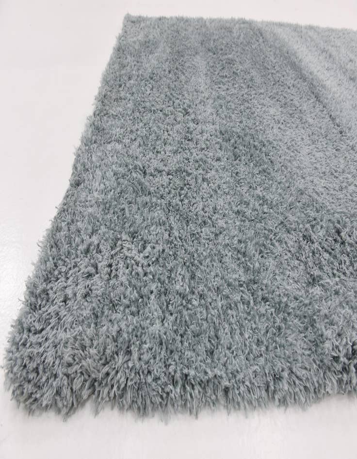 Detail image of 5' 4 x 7' 6 Solid Shag Rug