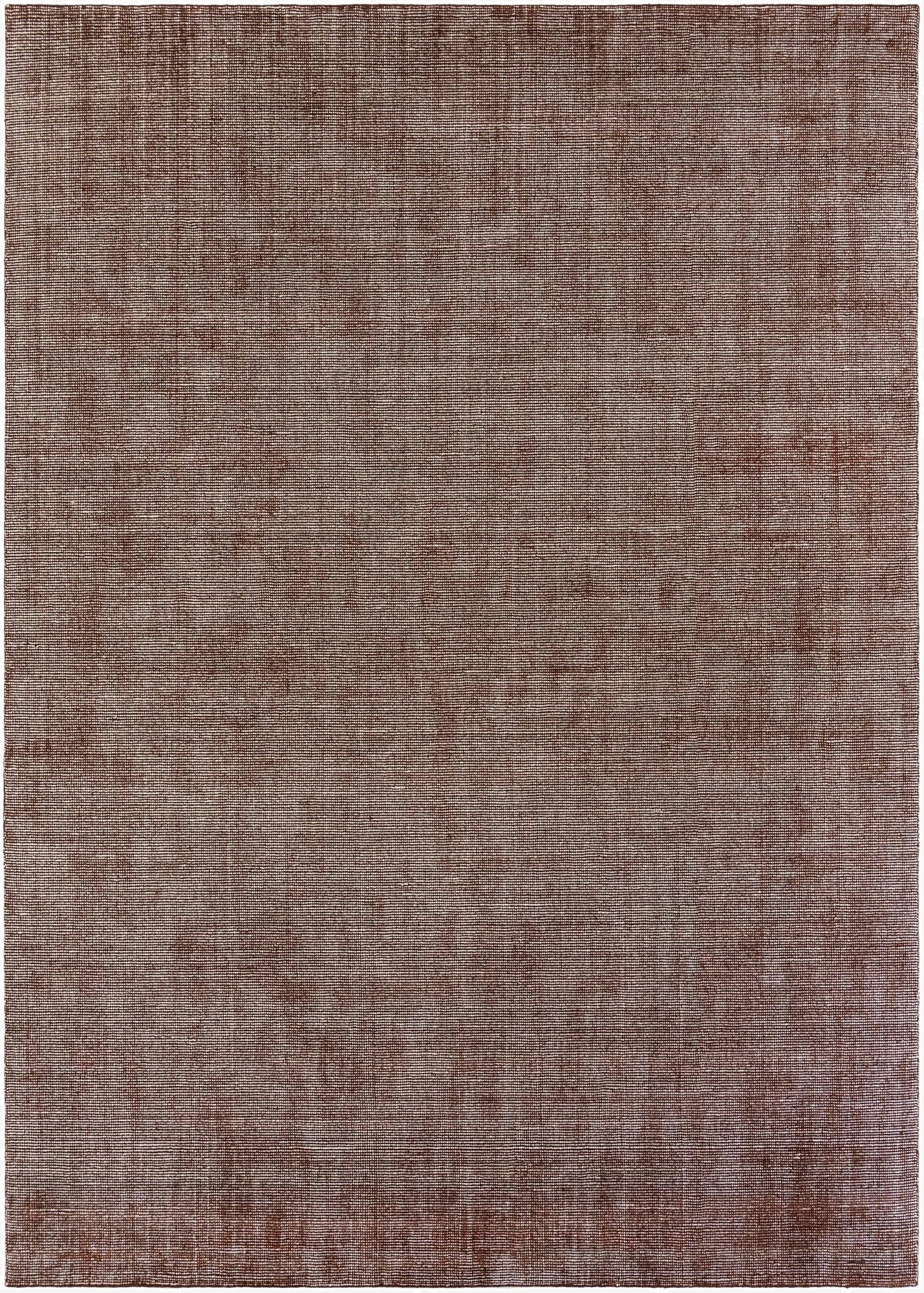 A 10x14 rectangular Jill Zarin English Manor rug in varying shades of brown and tan, featuring a modern, textured, high-pile wool surface.