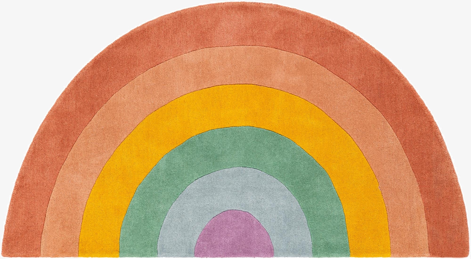A vibrant, freeform rainbow rug with high pile, featuring arcs of orange, peach, yellow, green, light blue, and purple.