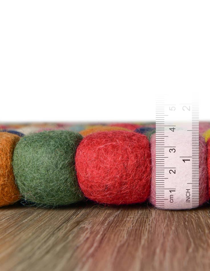 Detail image of 2' 2 x 3' 7 Felt Ball Wool Hearth Rug