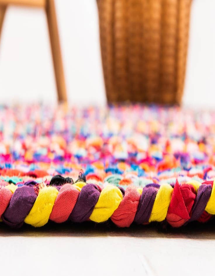 Detail image of 8' x 10'  Hand Braided Chindi Oval Rug