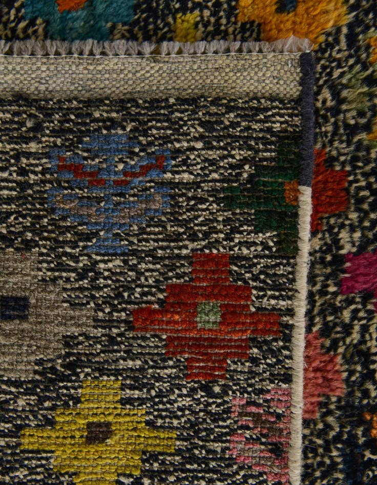 Detail image of 4' 4 x 6' 5 Hand Knotted Balouch Wool Rug