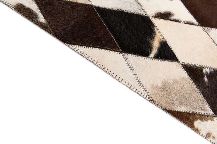4' 1 x 5' 10 Cowhide & Leather Rug