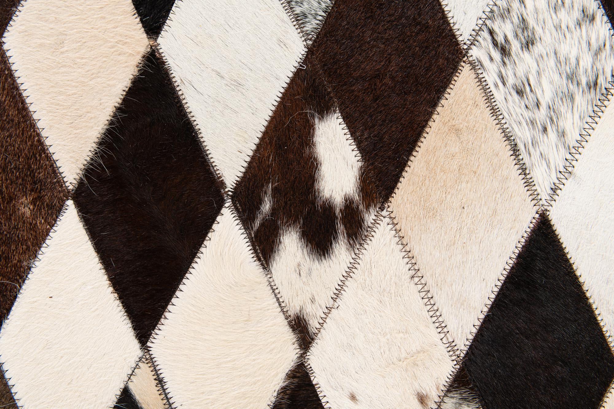 4' 1 x 5' 10 Cowhide & Leather Rug