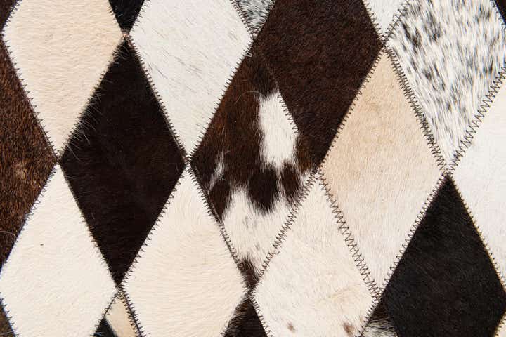 4' 1 x 5' 10 Cowhide & Leather Rug