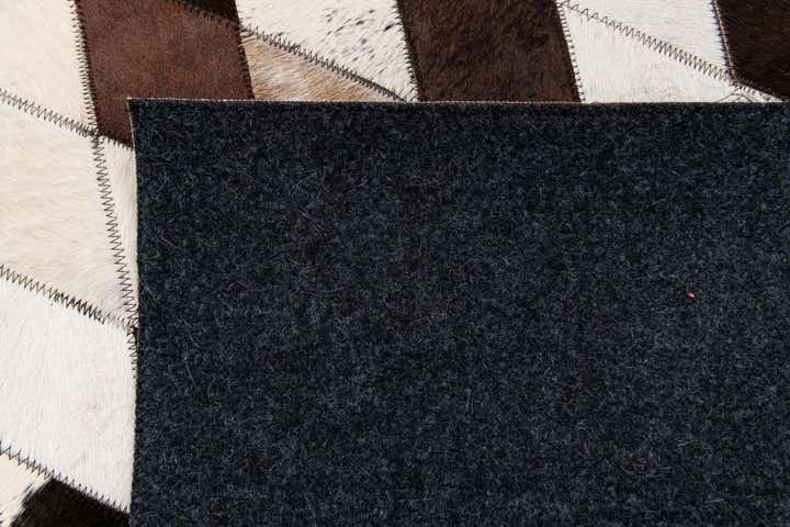 4' 1 x 5' 10 Cowhide & Leather Rug