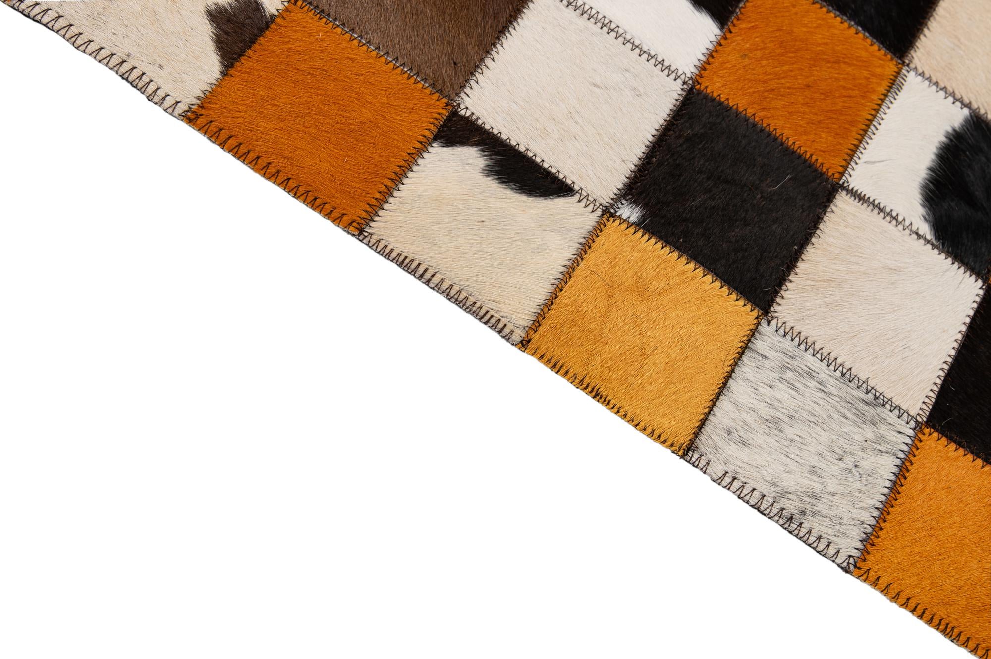 8' 1 x 9' 11 Cowhide - Patchwork Rug