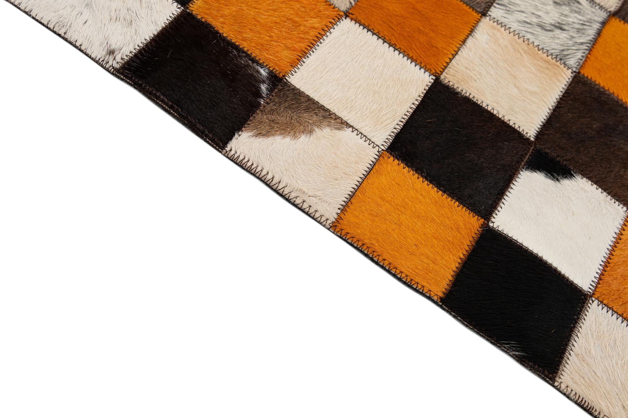 8' 1 x 9' 11 Cowhide - Patchwork Rug