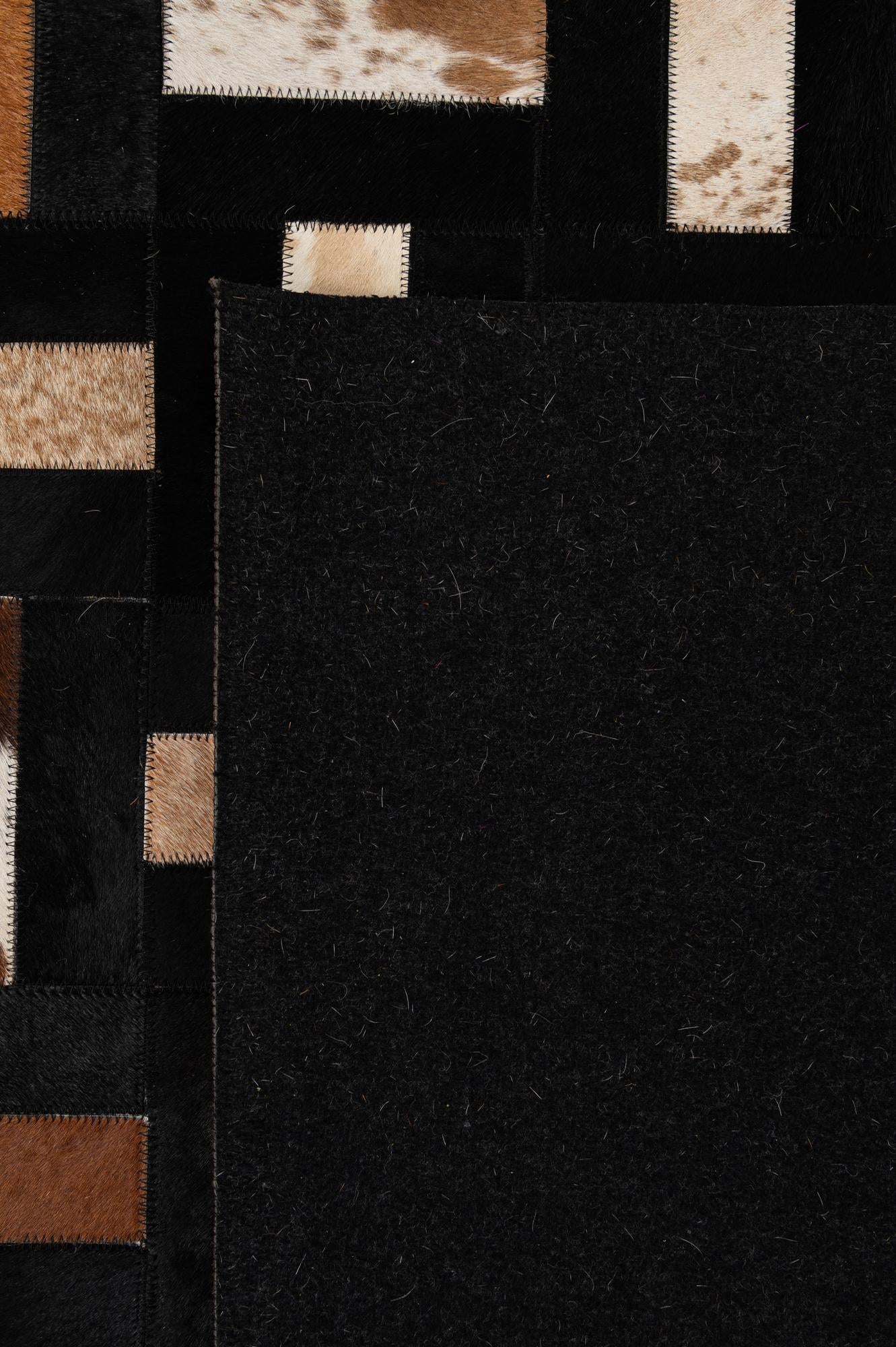 8' 2 x 10' Cowhide - Patchwork Rug