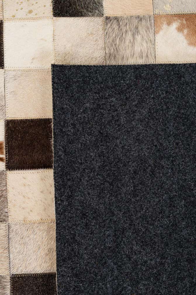 8' 1 x 9' 10 Cowhide - Patchwork Rug