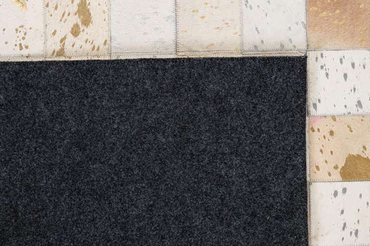 7' 11 x 9' 10 Cowhide - Patchwork Rug