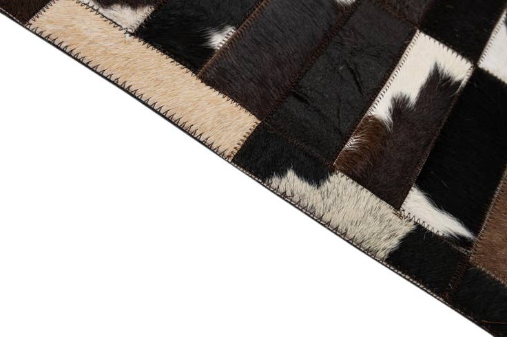 Detail image of 8' 2 x 9' 10 Cowhide - Patchwork Rug
