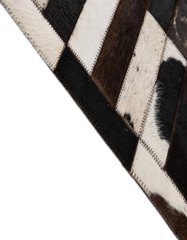 Detail image of 8' 2 x 9' 10 Cowhide - Patchwork Rug