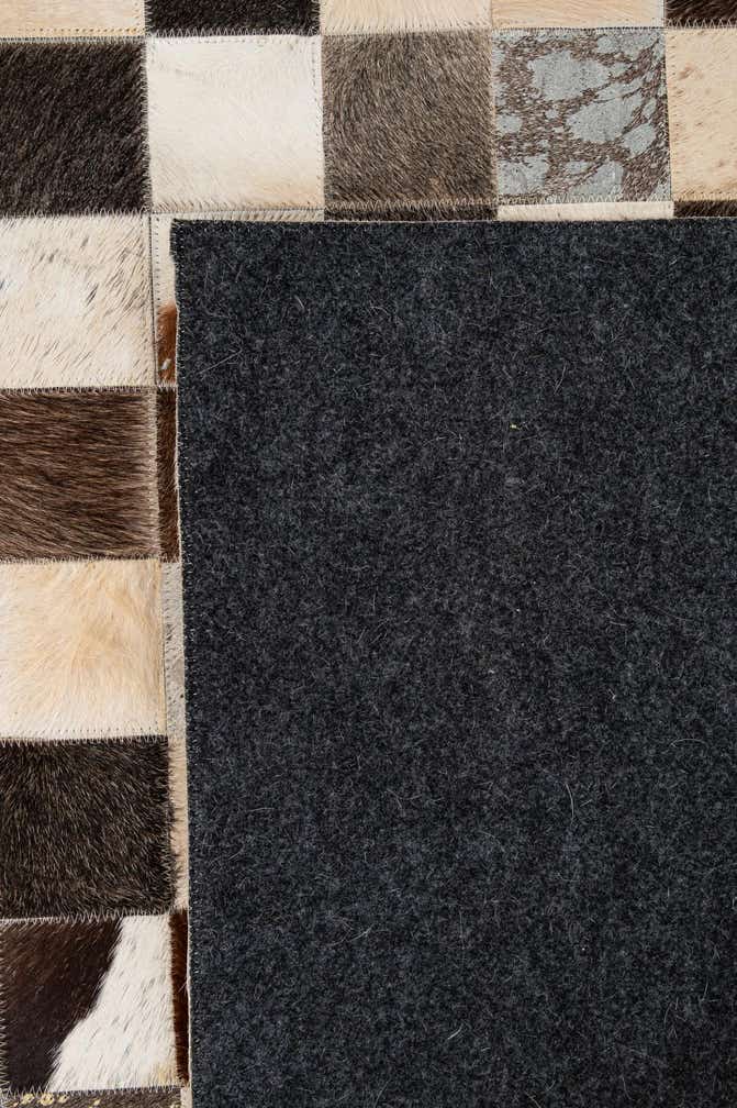 7' 11 x 9' 10 Cowhide - Patchwork Rug