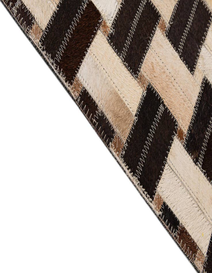 Detail image of 7' 7 x 9' 11 Cowhide - Patchwork Rug