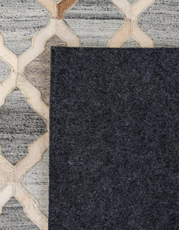 Detail image of 8' 1 x 9' 10 Cowhide - Patchwork Rug