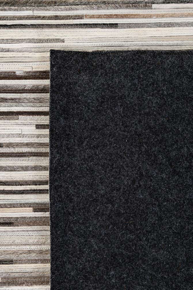 8' 1 x 10' 2 Cowhide - Patchwork Rug