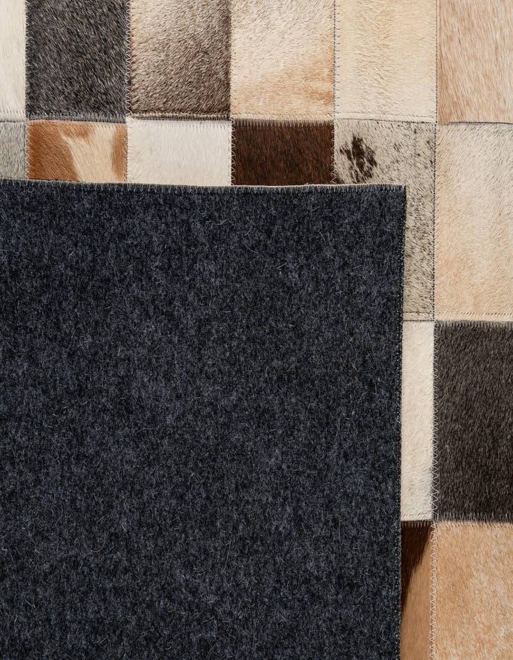 Detail image of 8' 1 x 9' 10 Cowhide - Patchwork Rug