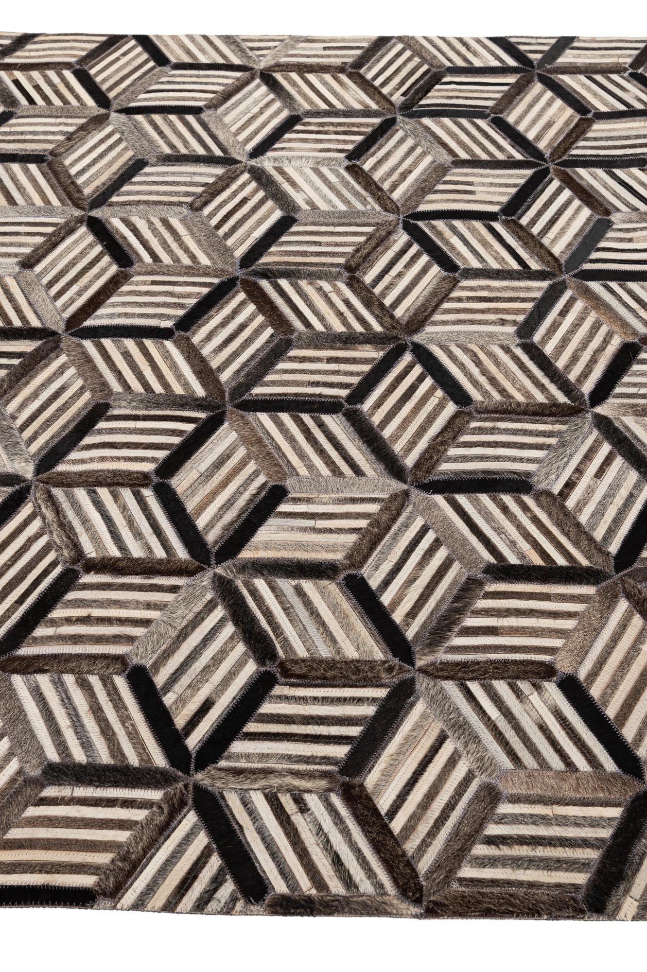 4' 11 x 7' 10 Cowhide - Patchwork Rug