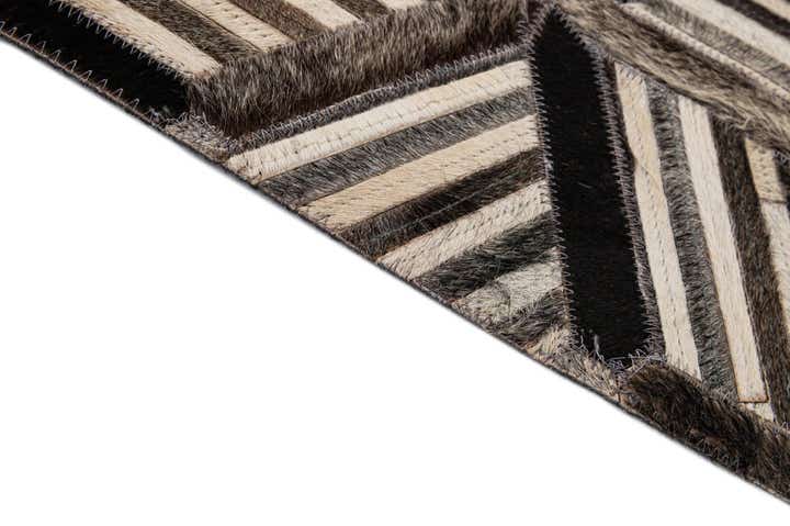 4' 11 x 7' 10 Cowhide - Patchwork Rug