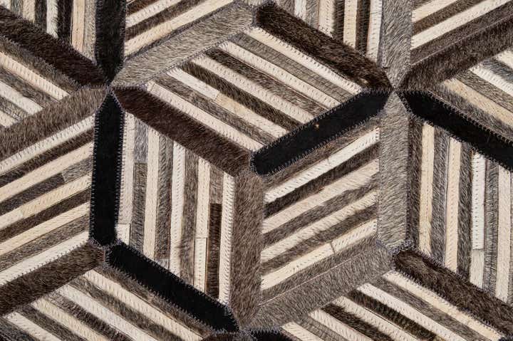 4' 11 x 7' 10 Cowhide - Patchwork Rug