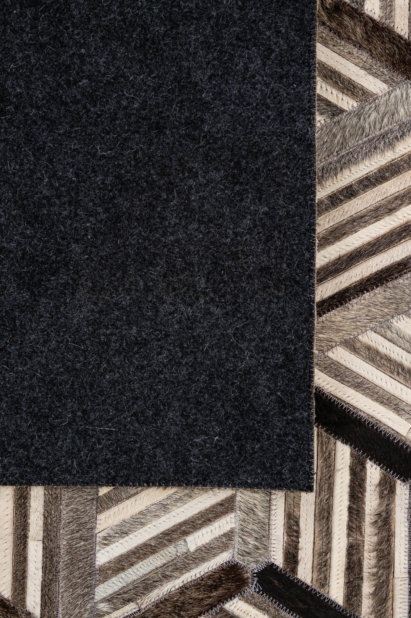 4' 11 x 7' 10 Cowhide - Patchwork Rug