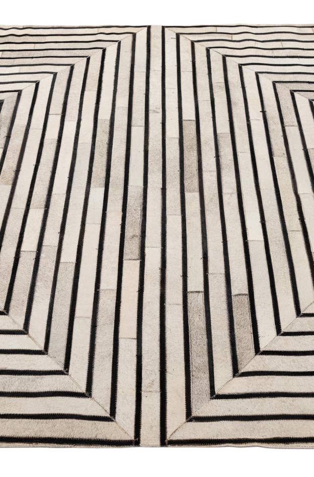 Detail image of 5' 5 x 7' 6 Cowhide - Patchwork Rug