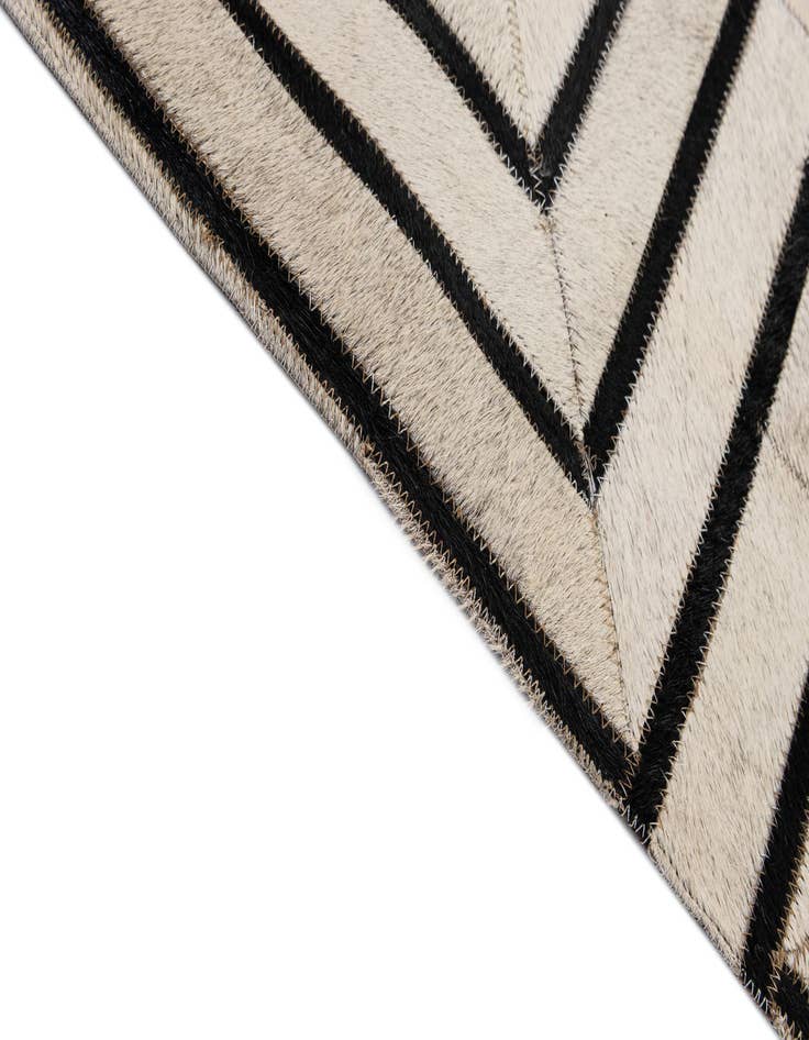 Detail image of 5' 5 x 7' 6 Cowhide - Patchwork Rug