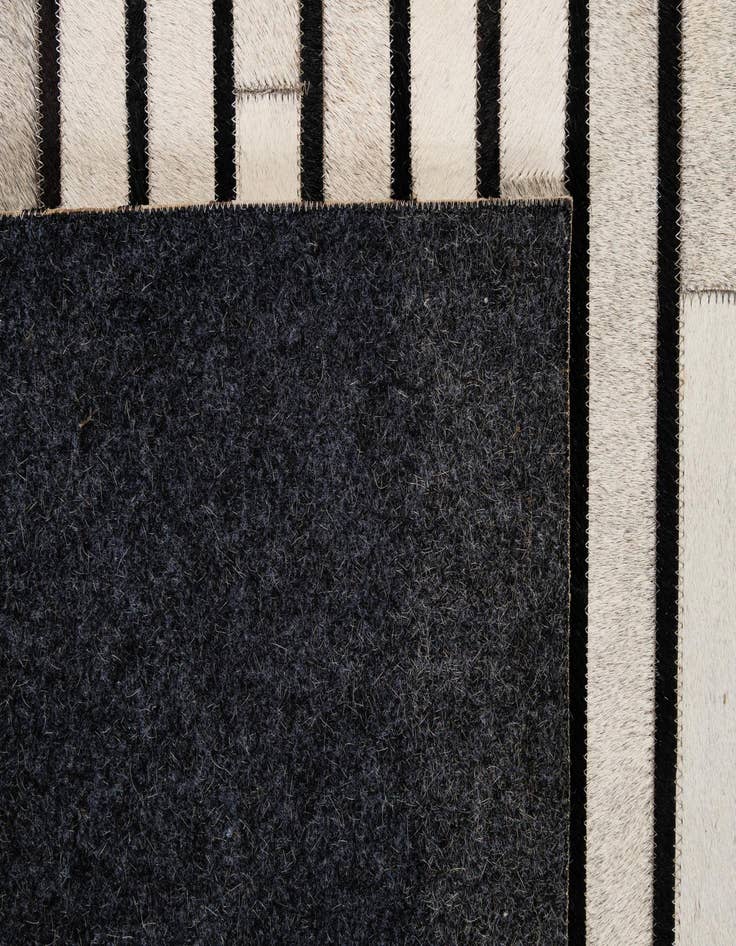 Detail image of 5' 5 x 7' 6 Cowhide - Patchwork Rug