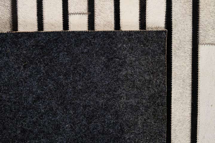 5' 5 x 7' 6 Cowhide - Patchwork Rug