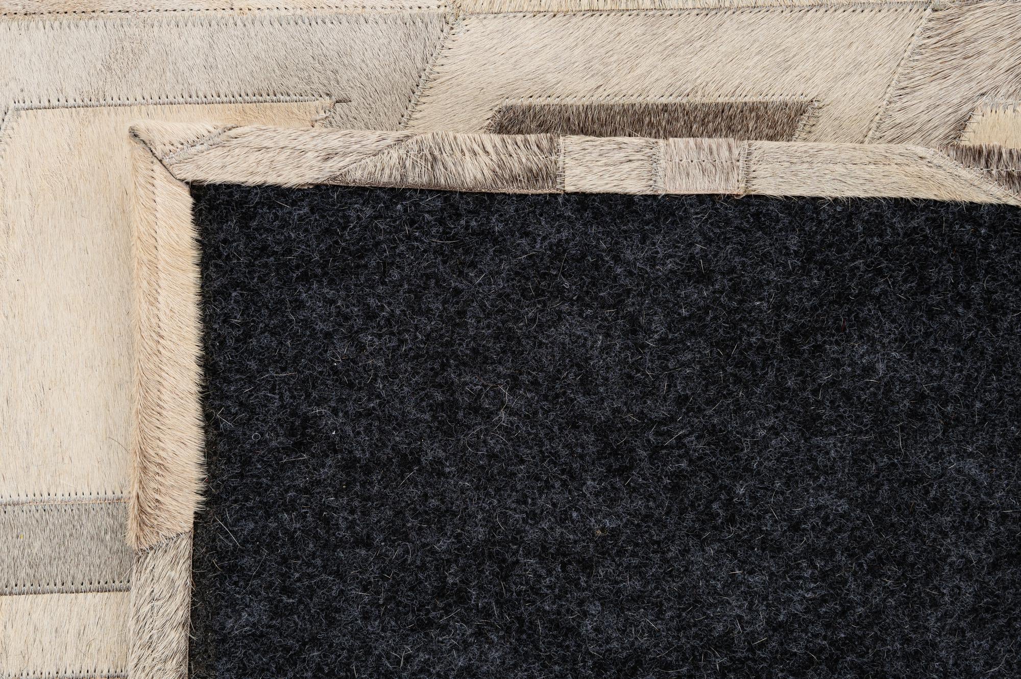 5' 2 x 7' 7 Cowhide - Patchwork Rug