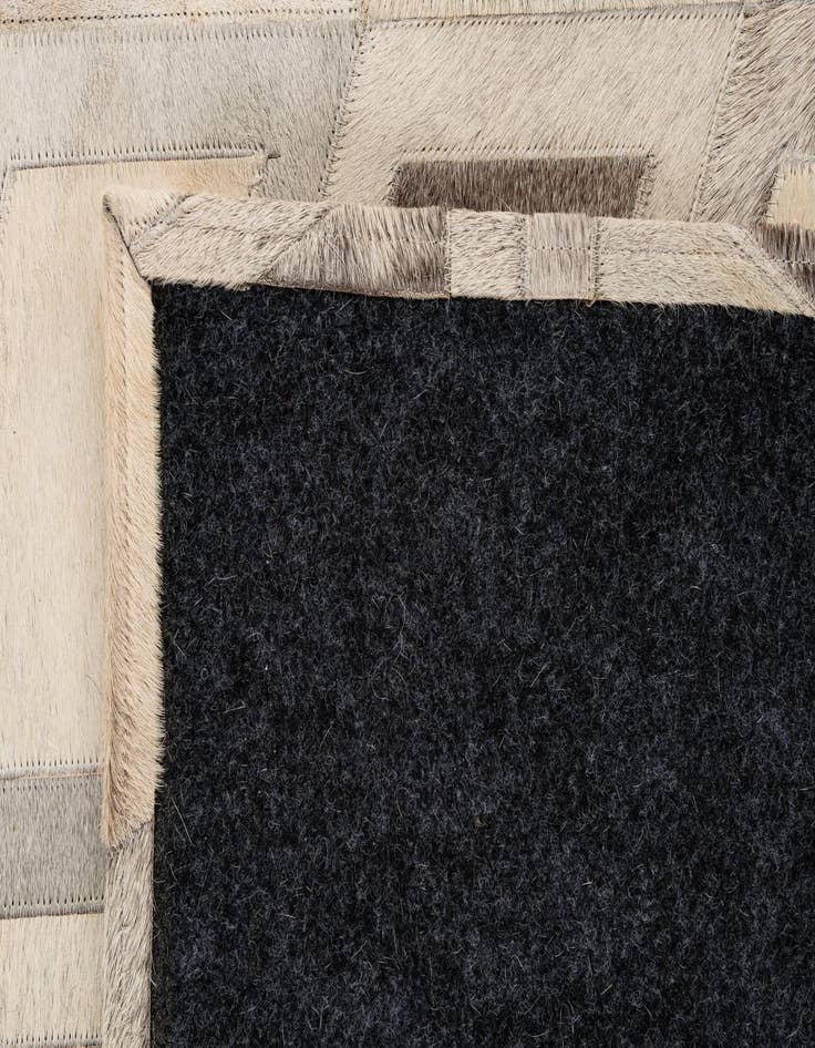 Detail image of 5' 2 x 7' 7 Cowhide - Patchwork Rug