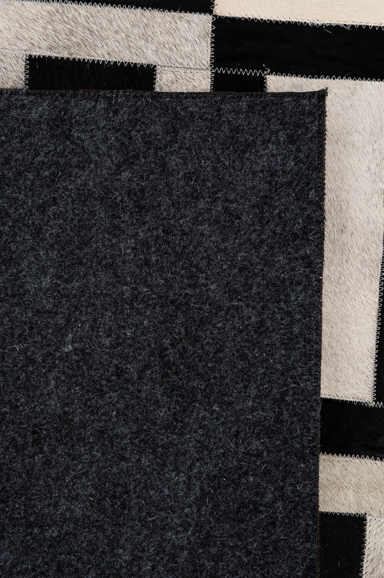 5' 1 x 7' 11 Cowhide - Patchwork Rug