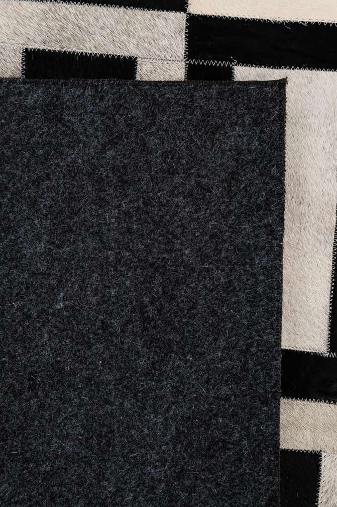 5' 1 x 7' 11 Cowhide - Patchwork Rug