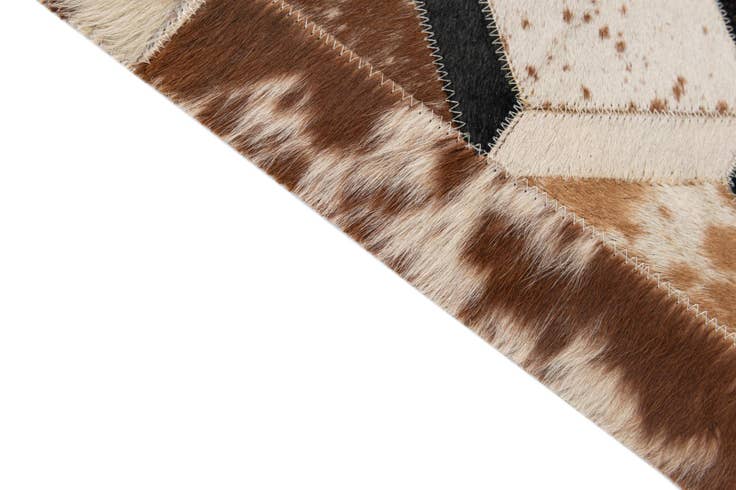 Detail image of 5' 1 x 8' 2 Cowhide - Patchwork Rug