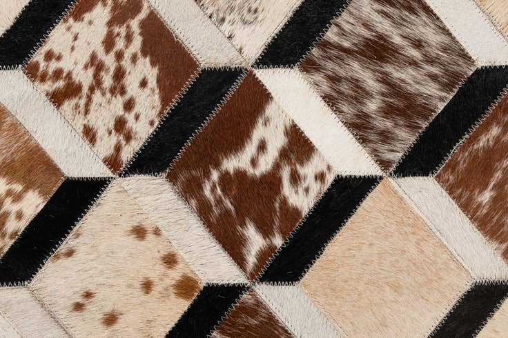 Detail image of 5' 1 x 8' 2 Cowhide - Patchwork Rug