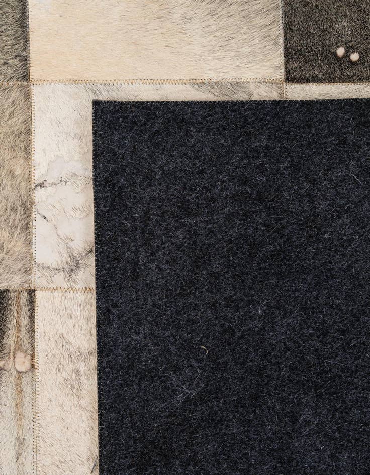 Detail image of 5' 2 x 8' Cowhide - Patchwork Rug