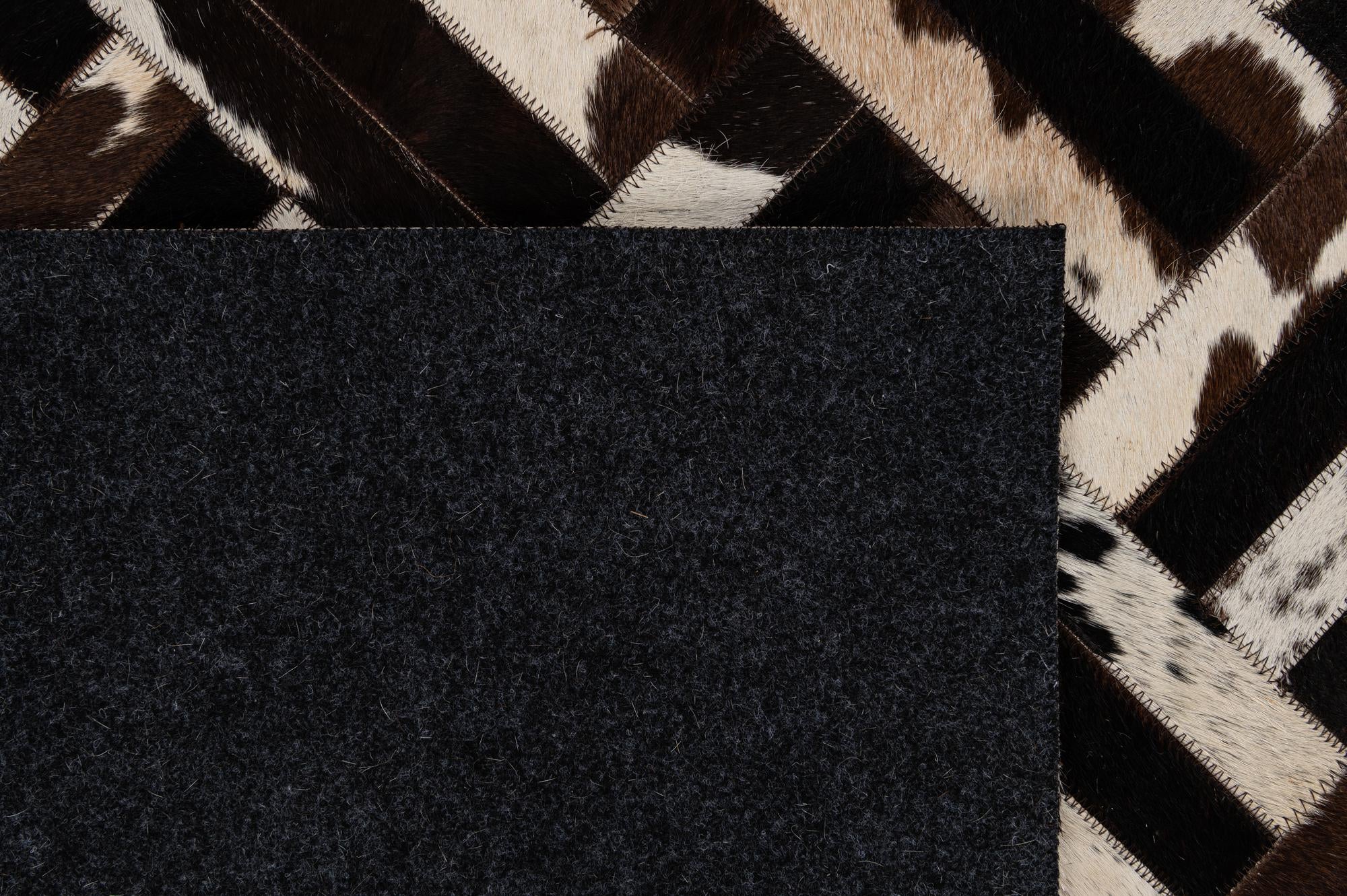 5' 1 x 8' Cowhide - Patchwork Rug