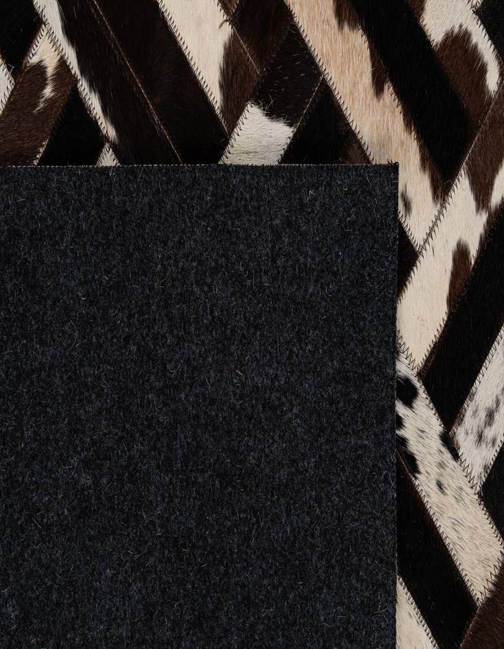Detail image of 5' 1 x 8' Cowhide - Patchwork Rug