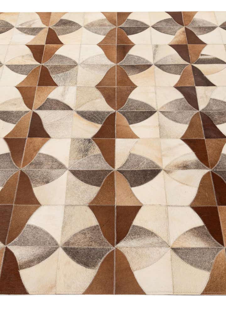 4' 11 x 7' 10 Cowhide - Patchwork Rug