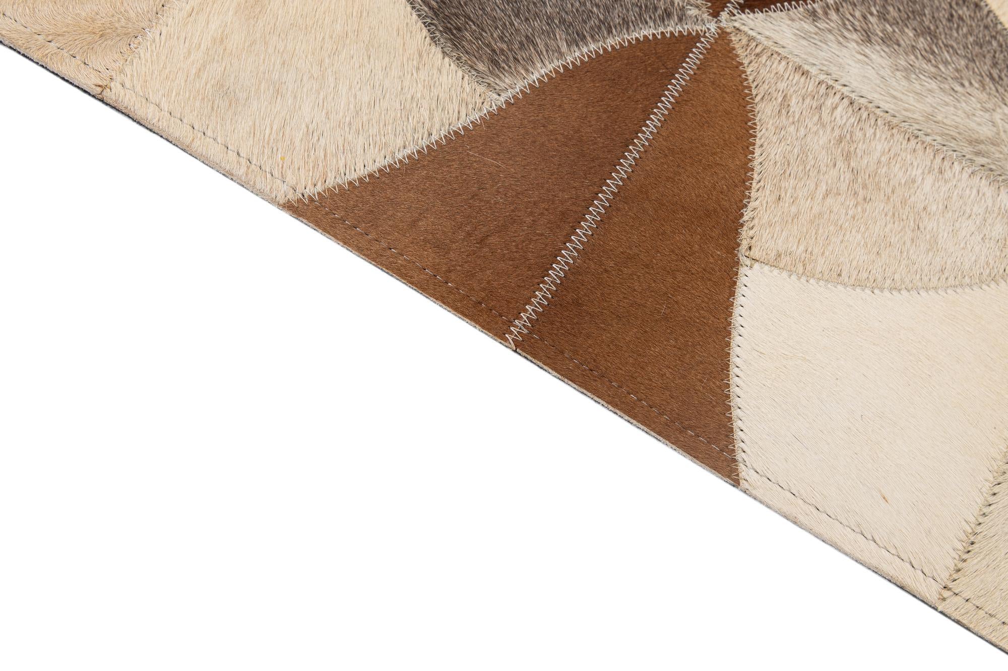 4' 11 x 7' 10 Cowhide - Patchwork Rug