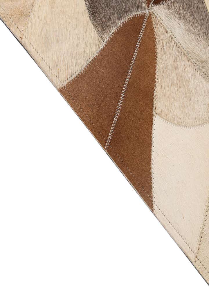 4' 11 x 7' 10 Cowhide - Patchwork Rug
