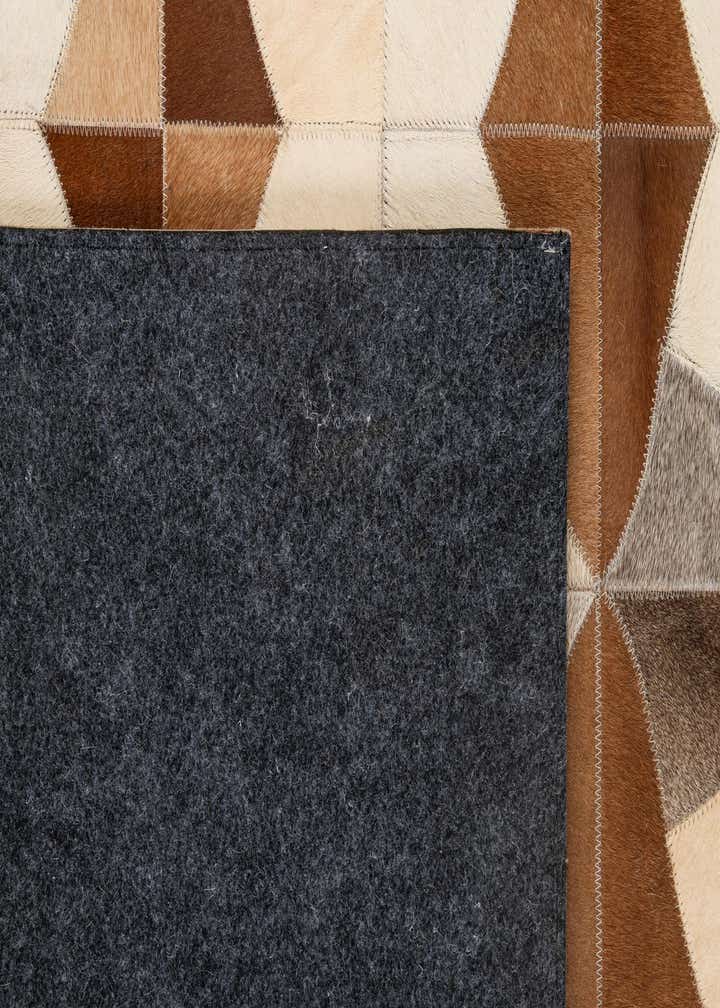 4' 11 x 7' 10 Cowhide - Patchwork Rug