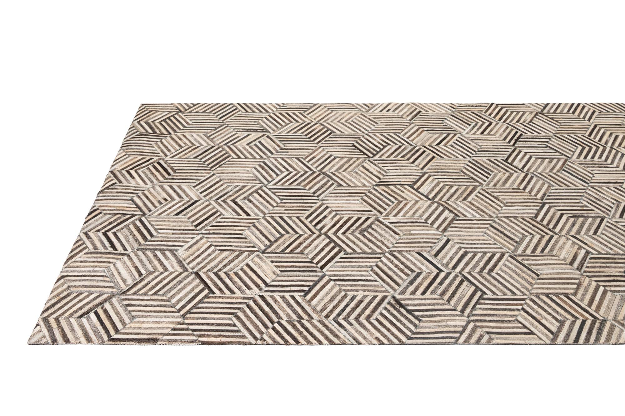 4' 11 x 8' 1 Cowhide - Patchwork Rug